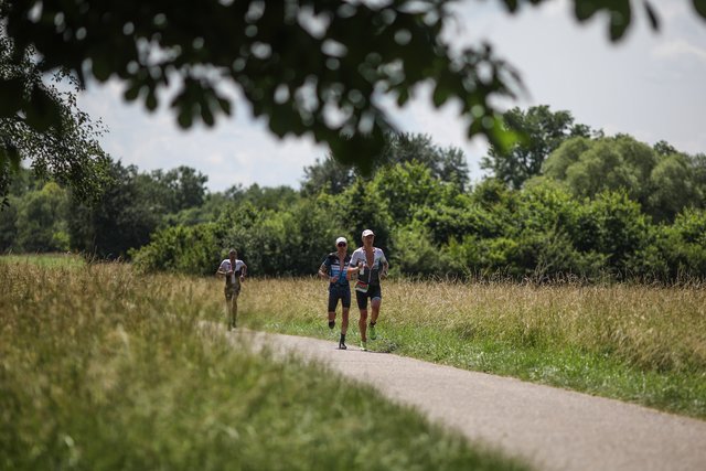 KRAICHGAU, GERMANY - JUNE 03:  Athletes compete in the running leg during the Sparkasse IRONMAN 70.3 Kraichgau powered by KraichgauEnergie on June 3, 2018 in Kraichgau, Germany.  (Photo by Joern Pollex/Getty Images for IRONMAN)