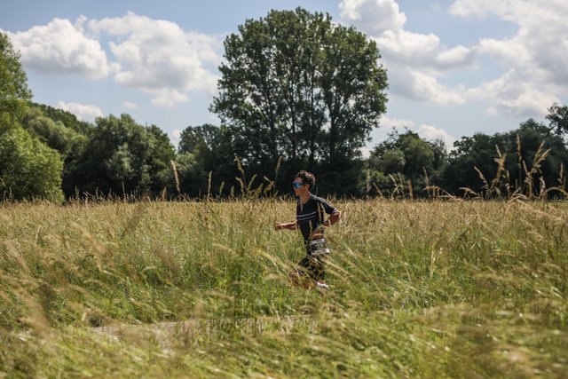 KRAICHGAU, GERMANY - JUNE 03:  Athletes compete in the running leg during the Sparkasse IRONMAN 70.3 Kraichgau powered by KraichgauEnergie on June 3, 2018 in Kraichgau, Germany.  (Photo by Joern Pollex/Getty Images for IRONMAN)