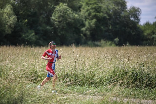KRAICHGAU, GERMANY - JUNE 03:  Athletes compete in the running leg during the Sparkasse IRONMAN 70.3 Kraichgau powered by KraichgauEnergie on June 3, 2018 in Kraichgau, Germany.  (Photo by Joern Pollex/Getty Images for IRONMAN)