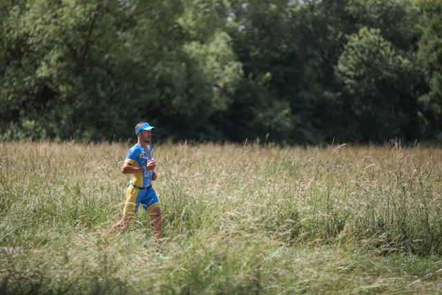 KRAICHGAU, GERMANY - JUNE 03:  Athletes compete in the running leg during the Sparkasse IRONMAN 70.3 Kraichgau powered by KraichgauEnergie on June 3, 2018 in Kraichgau, Germany.  (Photo by Joern Pollex/Getty Images for IRONMAN)