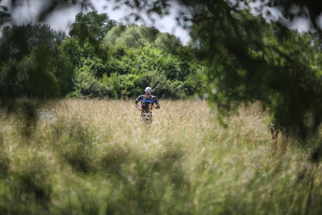 KRAICHGAU, GERMANY - JUNE 03:  Athletes compete in the running leg during the Sparkasse IRONMAN 70.3 Kraichgau powered by KraichgauEnergie on June 3, 2018 in Kraichgau, Germany.  (Photo by Joern Pollex/Getty Images for IRONMAN)