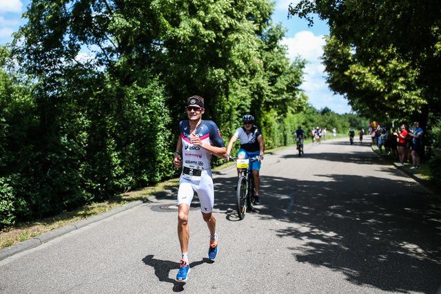 KRAICHGAU, GERMANY - JUNE 03:  Jan Frodeno competes in the running leg during the Sparkasse IRONMAN 70.3 Kraichgau powered by KraichgauEnergie on June 3, 2018 in Kraichgau, Germany.  (Photo by Joern Pollex/Getty Images for IRONMAN)