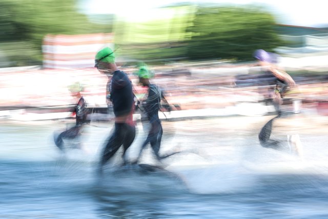KRAICHGAU, GERMANY - JUNE 03:  Athletes compete in the swim leg during the Sparkasse IRONMAN 70.3 Kraichgau powered by KraichgauEnergie on June 3, 2018 in Kraichgau, Germany.  (Photo by Joern Pollex/Getty Images for IRONMAN)