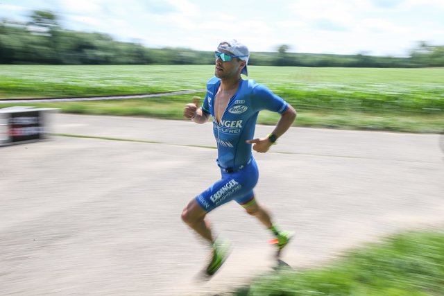 KRAICHGAU, GERMANY - JUNE 03:  Patrick Lange competes in the running leg during the Sparkasse IRONMAN 70.3 Kraichgau powered by KraichgauEnergie on June 3, 2018 in Kraichgau, Germany.  (Photo by Joern Pollex/Getty Images for IRONMAN)