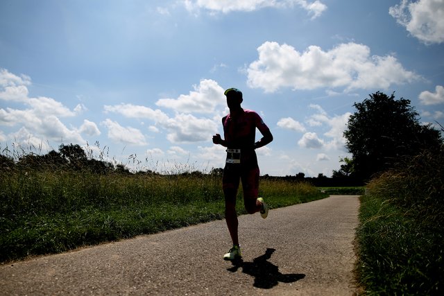 KRAICHGAU, GERMANY - JUNE 03:  Athletes compete in the running leg during the Sparkasse IRONMAN 70.3 Kraichgau powered by KraichgauEnergie on June 3, 2018 in Kraichgau, Germany.  (Photo by Joern Pollex/Getty Images for IRONMAN)