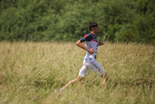 KRAICHGAU, GERMANY - JUNE 03:  Jan Frodeno competes in the running leg during the Sparkasse IRONMAN 70.3 Kraichgau powered by KraichgauEnergie on June 3, 2018 in Kraichgau, Germany.  (Photo by Joern Pollex/Getty Images for IRONMAN)