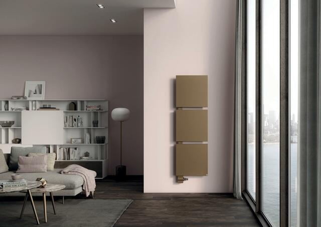 „Noble Gold“ setzt edle Akzente: Heizkörper Signo bringt die Farbe flächig in den Raum – einzeln, zu zweit oder zu dritt kombiniert fügen sich die quadratischen Elemente flexibel in jedes Raumkonzept. Design-Objekt oder Heizkörper? Hier sind diese Grenzen fließend, insbesondere, wenn er ausdrucksstarke Farben fast wie ein Bild in den Raum bringt. Foto: Kermi GmbH/akz-o